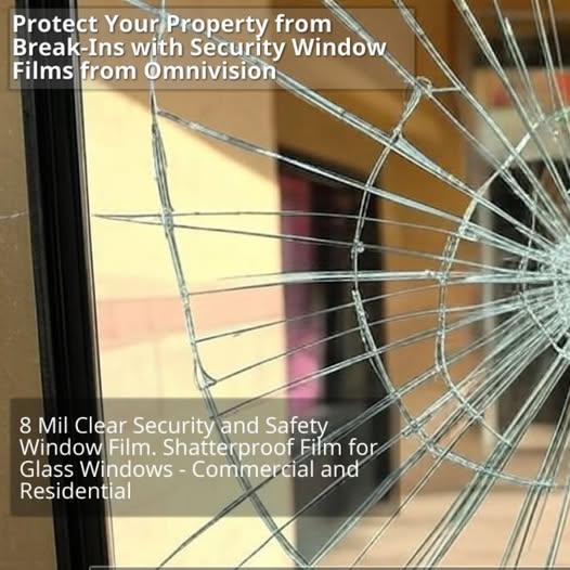 Cracked Glass Held Together by Security Film